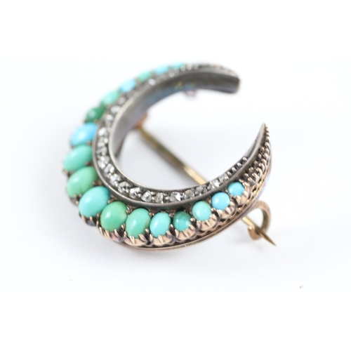 29 - 9ct white gold turquoise & diamond crescent brooch (7g)