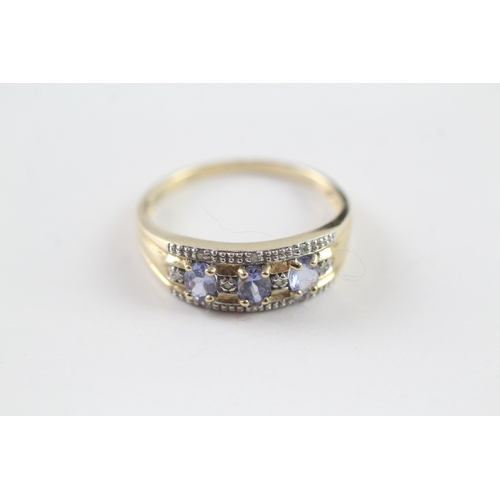 36 - 9ct gold blue gemstone and diamond dress ring (2.3g) Size P