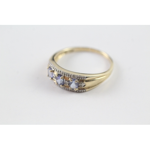 36 - 9ct gold blue gemstone and diamond dress ring (2.3g) Size P