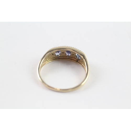 36 - 9ct gold blue gemstone and diamond dress ring (2.3g) Size P