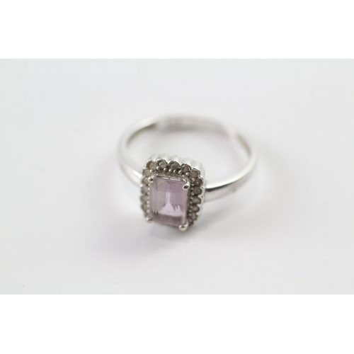 44 - 9ct white gold pink gemstone and diamond halo dress ring (2.2g) Size N