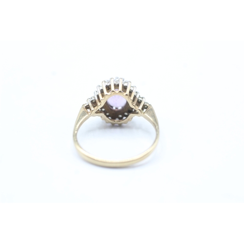 42 - 9ct gold amethyst and diamond halo set ring (2.5g) Size L 1/2