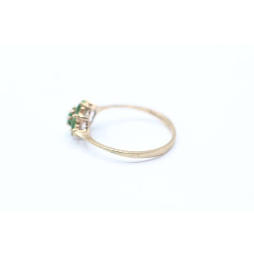 49 - 9ct gold emerald cluster ring (1.1g) Size M