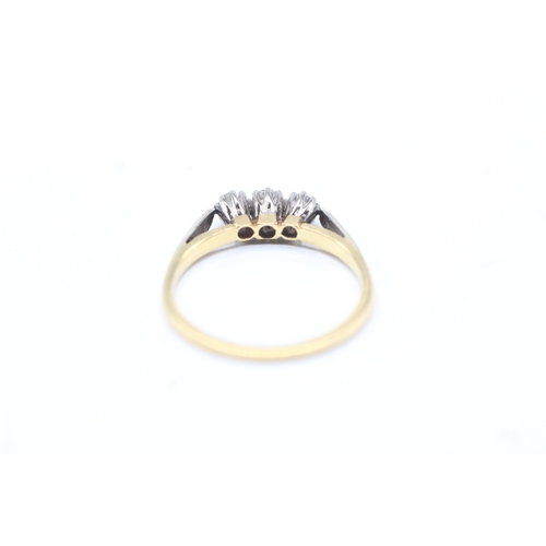 64 - 18ct gold three stone diamond ring (2.2g) Size N 1/2