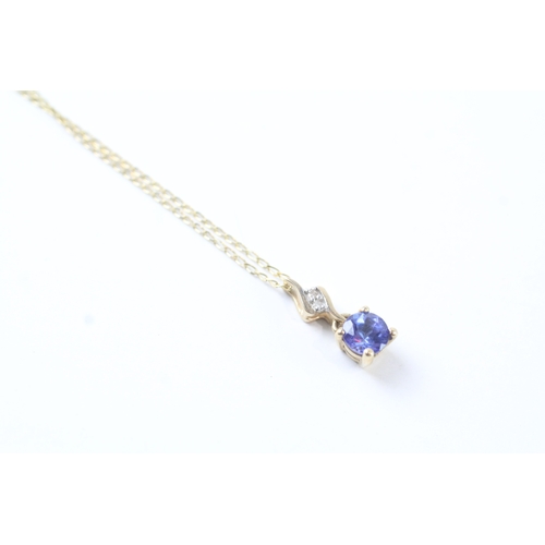 74 - 9ct gold blue gemstone & diamond pendant necklace (1.5g)