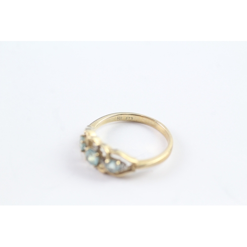 8 - 9ct gold blue & white gemstone dress ring (2g) Size K