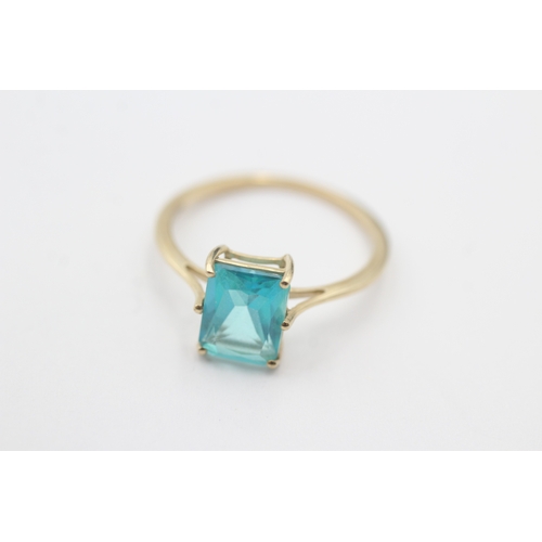 81 - 9ct gold blue gemstone dress ring (1.7g) Size P