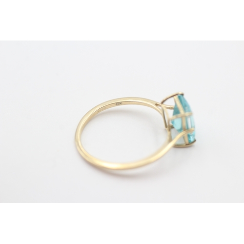 81 - 9ct gold blue gemstone dress ring (1.7g) Size P