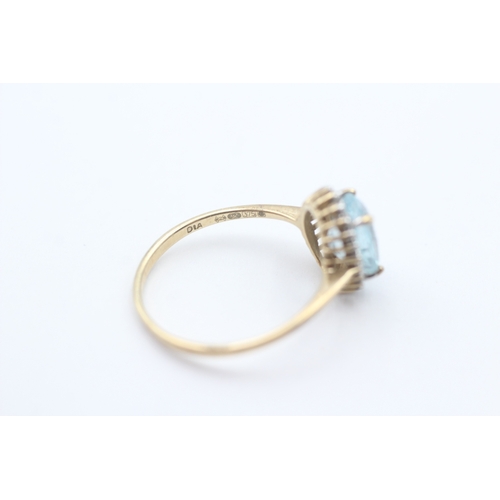 82 - 9ct gold blue gemstone & diamond cluster ring (2g) Size P