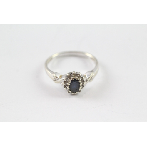 50 - 9ct white gold sapphire and diamond halo dress ring (3.2g) Size P