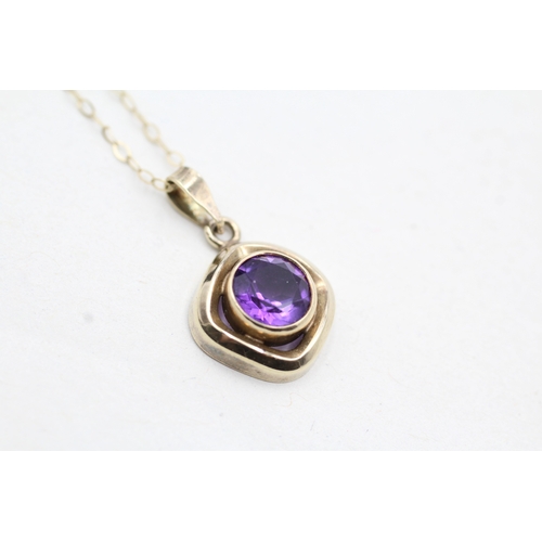 53 - 9ct gold amethyst pendant on chain (1.5g)