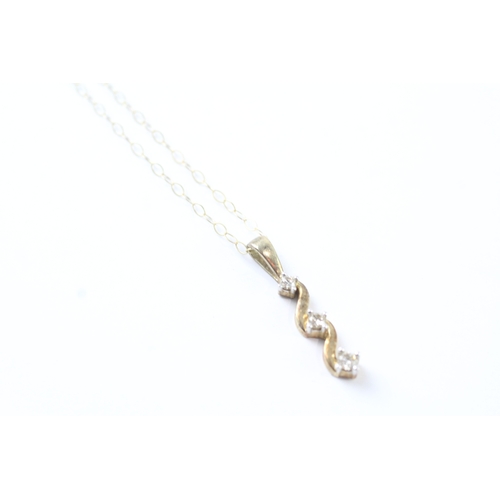 93 - 9ct gold diamond trilogy drop pendant necklace (1.3g)