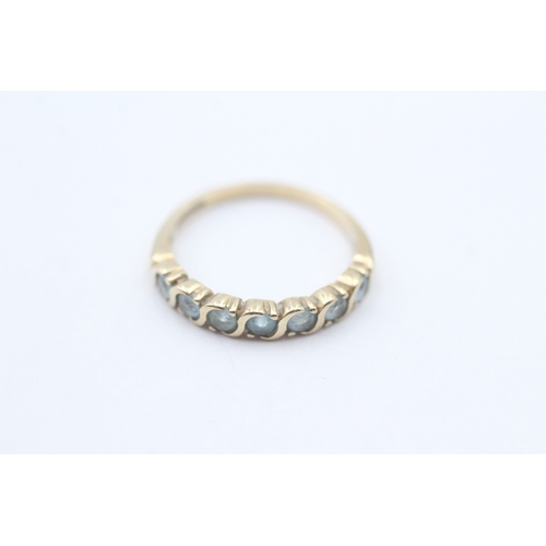 95 - 9ct gold blue gemstone half eternity ring (1.9g) Size N