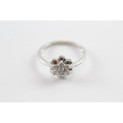 63 - 9ct white gold diamond floral cluster dress ring (2g) Size N