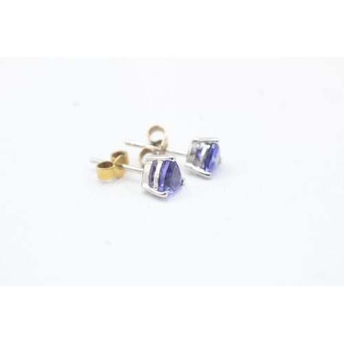 71 - 9ct gold trillion cut blue gemstone stud earrings (1.2g)