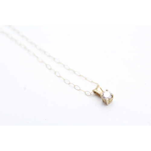 77 - 9ct gold diamond pendant necklace (0.6g)