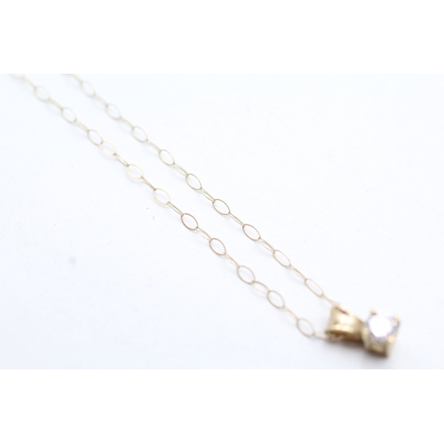 77 - 9ct gold diamond pendant necklace (0.6g)