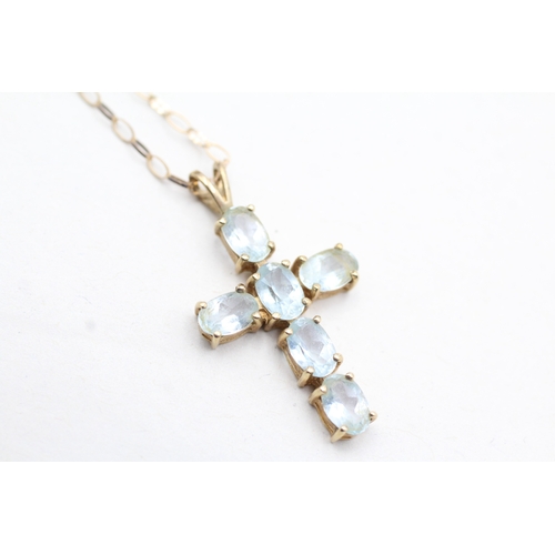 80 - 9ct gold blue topaz set cross pendant necklace (2.5g)