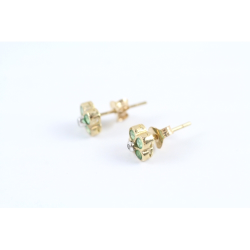 83 - 9ct gold diamond & emerald stud earrings (0.9g)