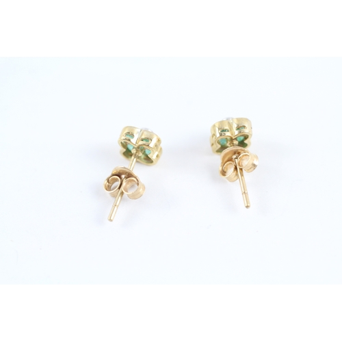 83 - 9ct gold diamond & emerald stud earrings (0.9g)