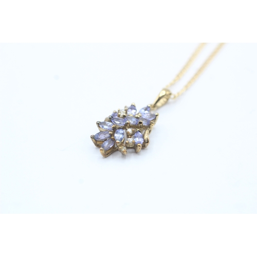 88 - 9ct gold tanzanite & diamond cluster pendant necklace (2.4g)