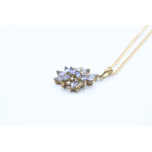 88 - 9ct gold tanzanite & diamond cluster pendant necklace (2.4g)