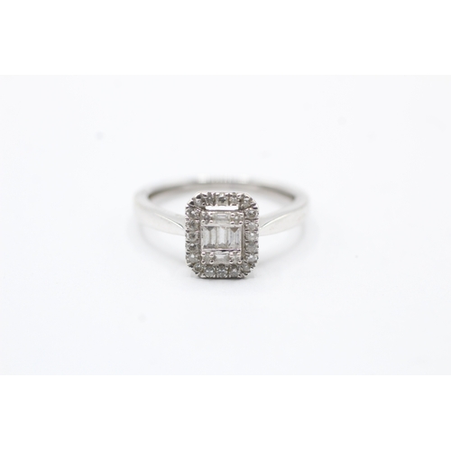 102 - 9ct white gold diamond cluster ring (2.2g) Size K