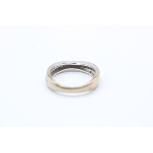 103 - 9ct white gold diamond twist ring (2.6g) Size K 1/2