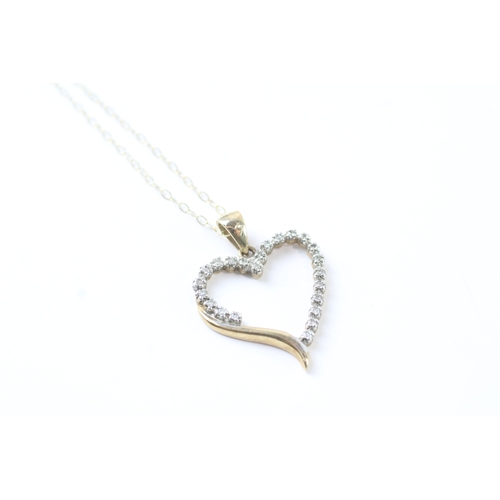 106 - 9ct gold diamond heart shape pendant necklace (1.6g)