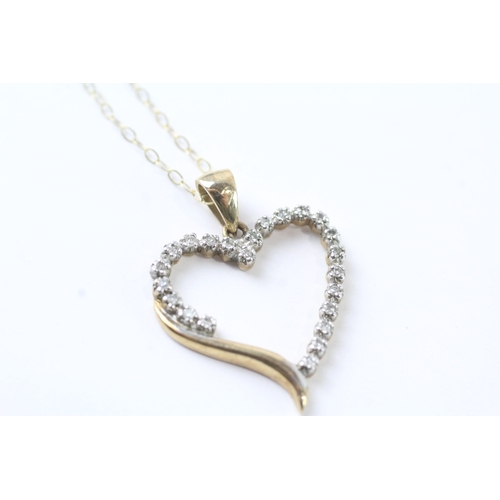 106 - 9ct gold diamond heart shape pendant necklace (1.6g)