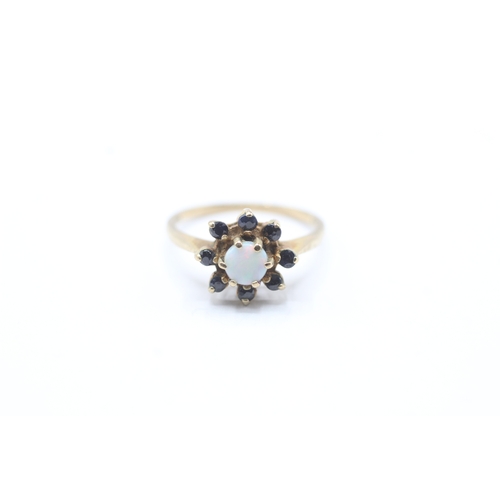 108 - 9ct gold sapphire and opal halo ring (2.7g) Size O 1/2