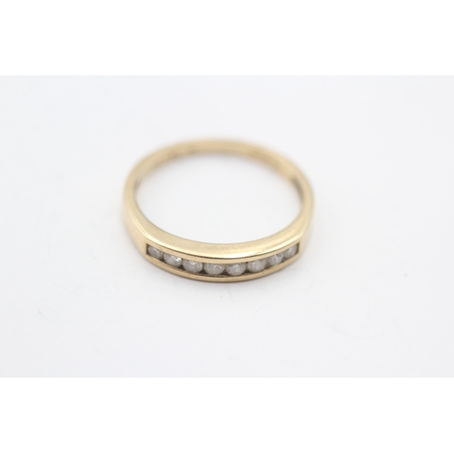 119 - 9ct gold diamond channel set ring (1.9g) Size N