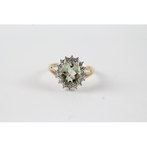 128 - 9ct gold diamond and green gemstone ring Size O 1/2 - stone 9.9mm by 7.7mm