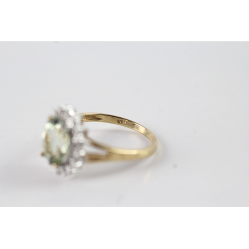 128 - 9ct gold diamond and green gemstone ring Size O 1/2 - stone 9.9mm by 7.7mm