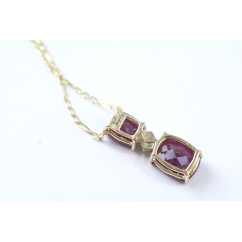 129 - 9ct gold faceted red gemstone & diamond pendant necklace (4g)