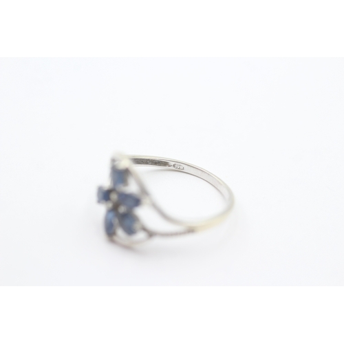 39 - 9ct gold blue gemstone & diamond dress ring (1.5g) Size N