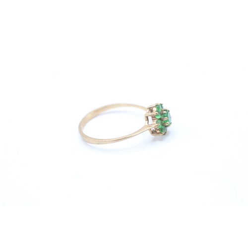 49 - 9ct gold emerald cluster ring (1.1g) Size M