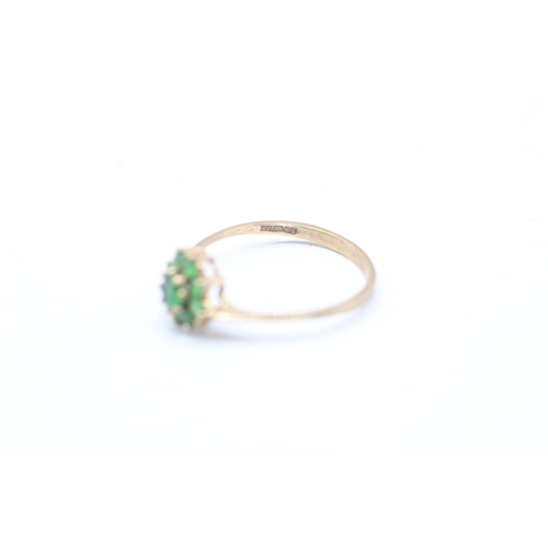 49 - 9ct gold emerald cluster ring (1.1g) Size M