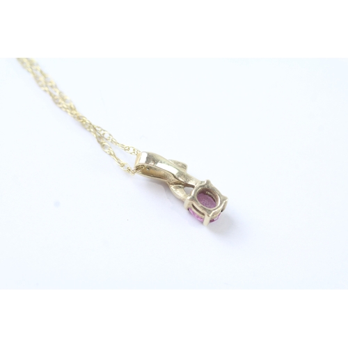 59 - 9ct gold oval cut pink sapphire & diamond pendant necklace (1.4g)