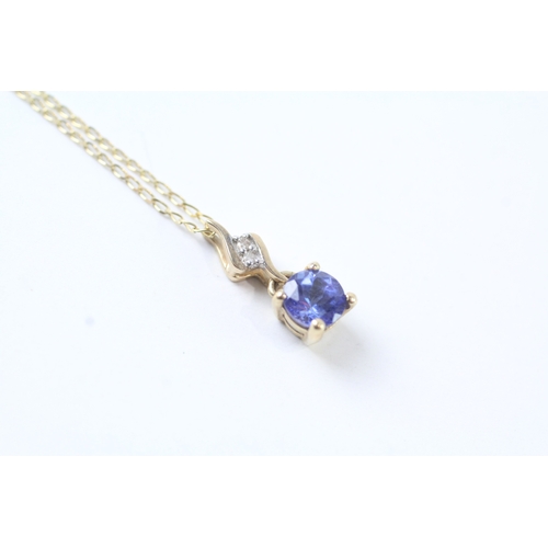 74 - 9ct gold blue gemstone & diamond pendant necklace (1.5g)