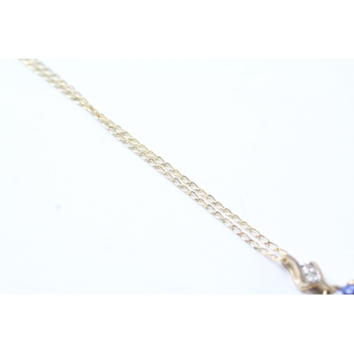 74 - 9ct gold blue gemstone & diamond pendant necklace (1.5g)