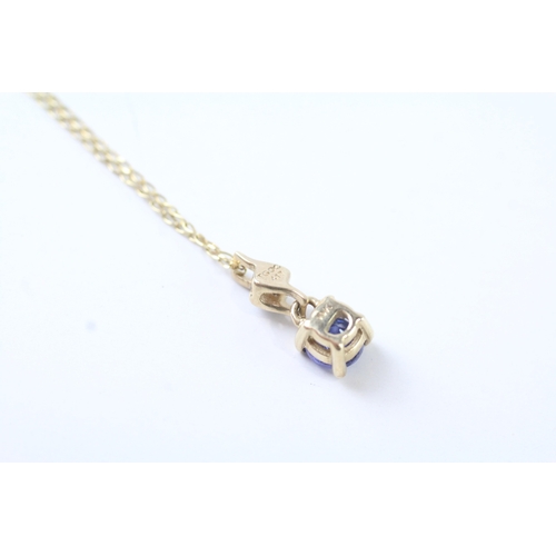 74 - 9ct gold blue gemstone & diamond pendant necklace (1.5g)