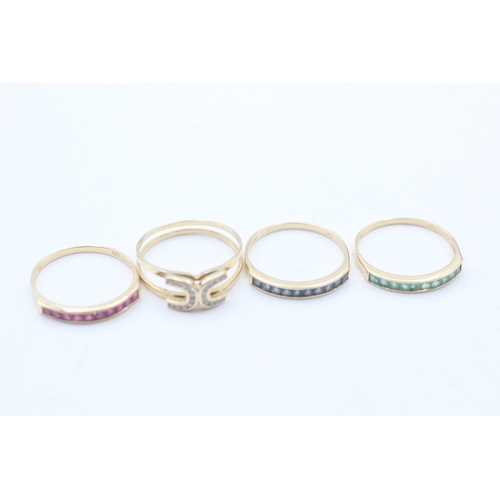 78 - 4 x 14ct gold diamond, ruby, sapphire and emerald interchangeable ring set (6.9g) Size S