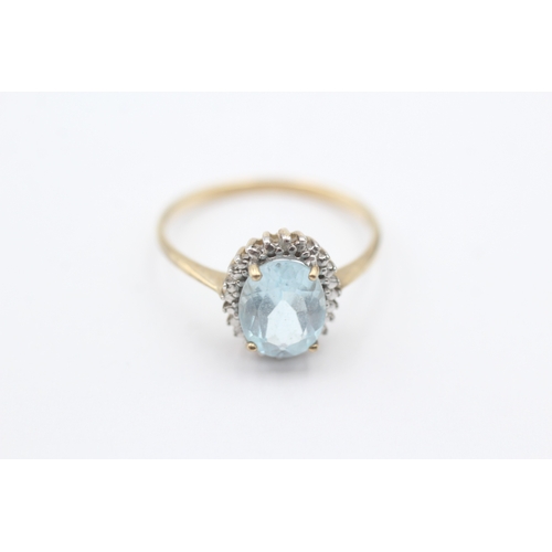 82 - 9ct gold blue gemstone & diamond cluster ring (2g) Size P