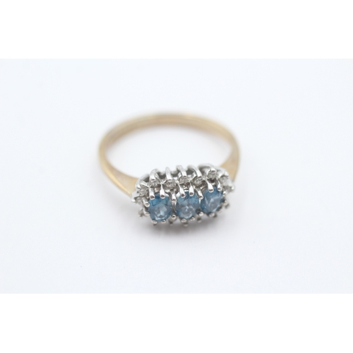 83 - 9ct gold blue gemstone & diamond dress ring (2.5g) Size M