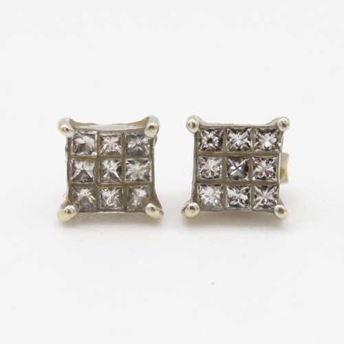 135 - 9ct white gold diamond stud earrings (1.6g)