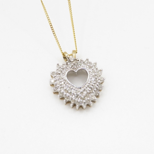 239 - 9ct gold diamond heart halo pendant on chain (3.7g)