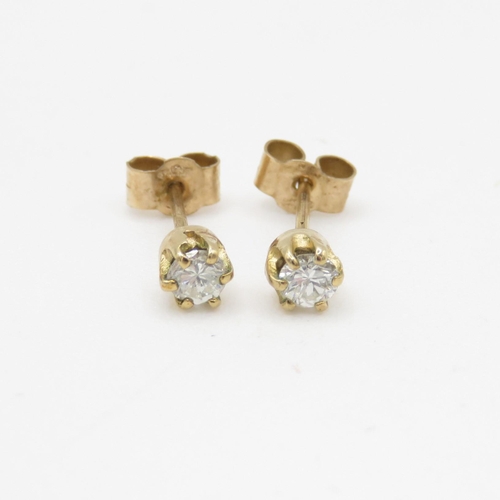 40 - 9ct gold diamond stud earrings (0.5g)