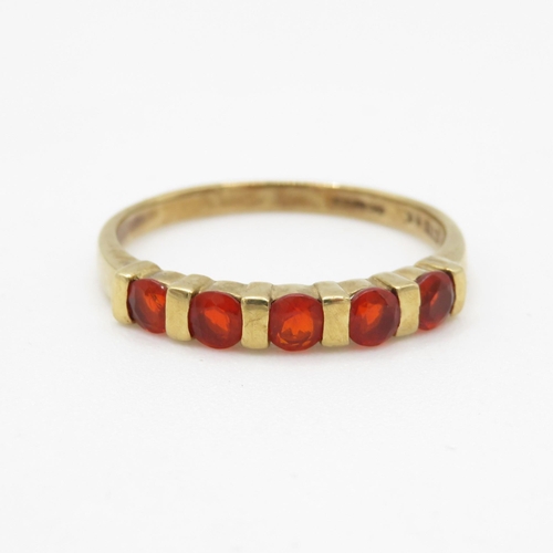 51 - 9ct gold orange gemstone half eternity ring (2.3g) Size U