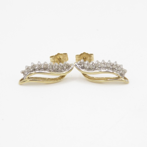 54 - 9ct gold diamond leaf form stud earrings (1.4g)